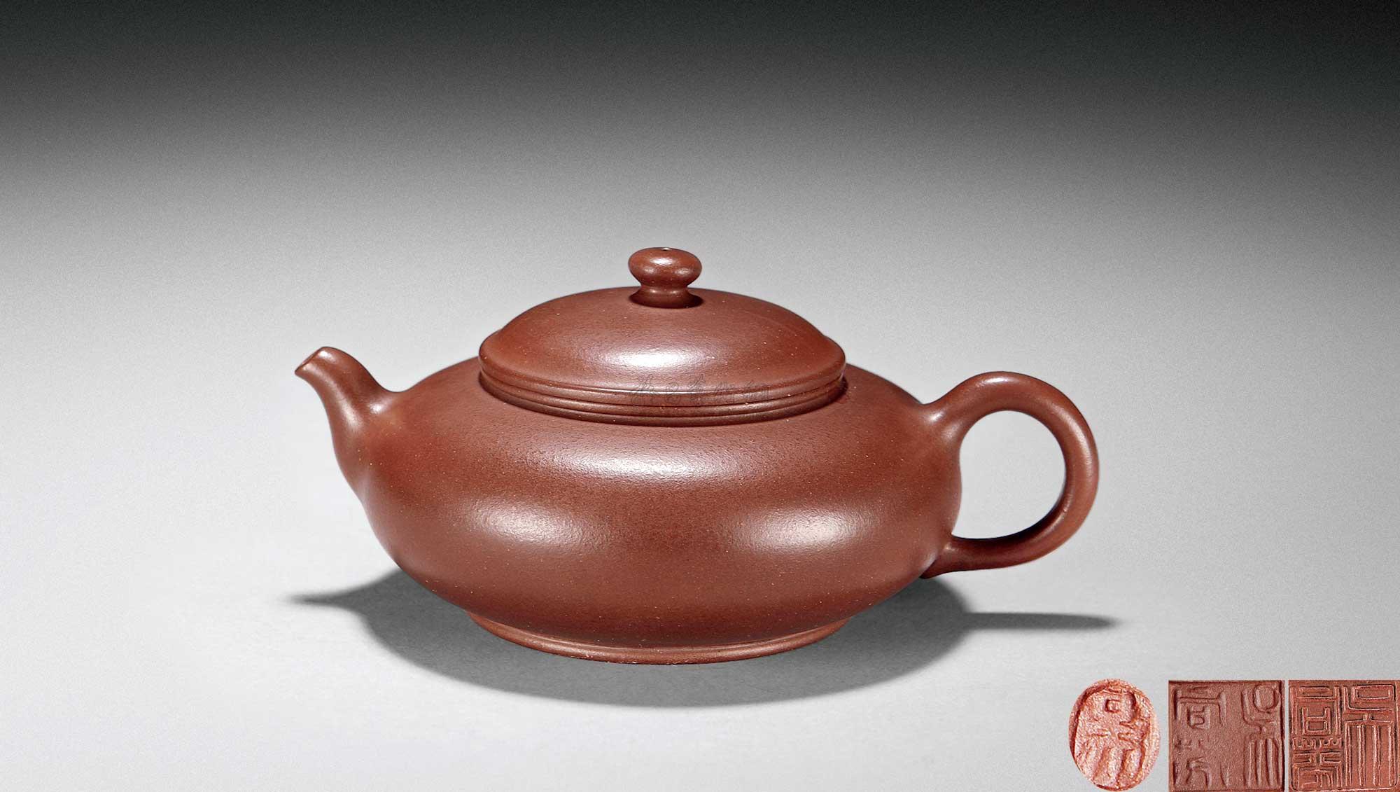 03拍品信息拍品名称吴同芬扁圆壶拍品分类工艺品杂项>紫砂尺寸长1cmm